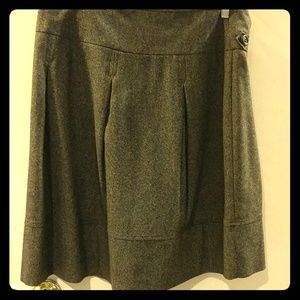 Pleated midi length brown wool skirt